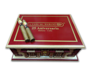 NAME: La Gloria Cubana – 25th Aniversario Humidor LCDH n-30 PRESENTATION: In 2015, Habanos SA announced this limited edition humidor under the brand of La Gloria Cubana in celebration of the 25th anniversary of La Casa del Habano stores. This exclusive limited humidor contains two different vitolas: Piramides (52 x 155 mm) Robusto Extra (48 x 170 mm) There are 15 cigars per vitola, making it a total of 30 cigars in each humidor. Production is limited to total of 3,500 humidors and available exclusively through La Casa del Habano locations. Body: Medium to Full Packing Code: SPB-S-n-n-n-30